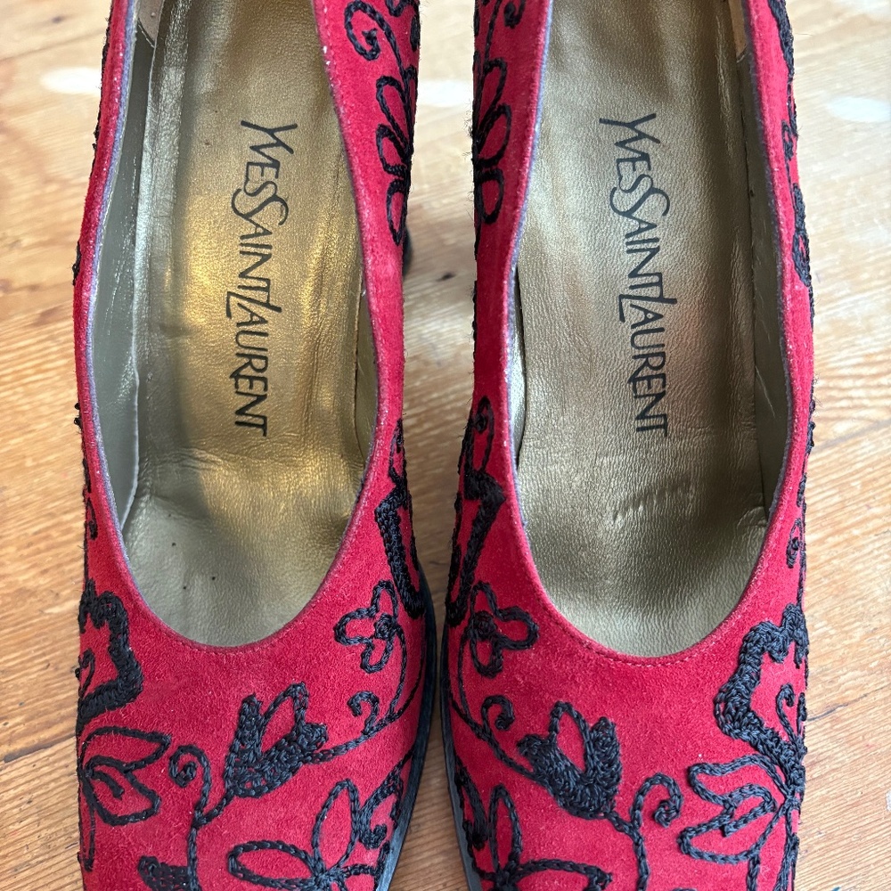YVES SAINT LAURENT RED SUEDE WITH BLACK SUEDE EMBROIDERED HEELS.  SIZE 6.5